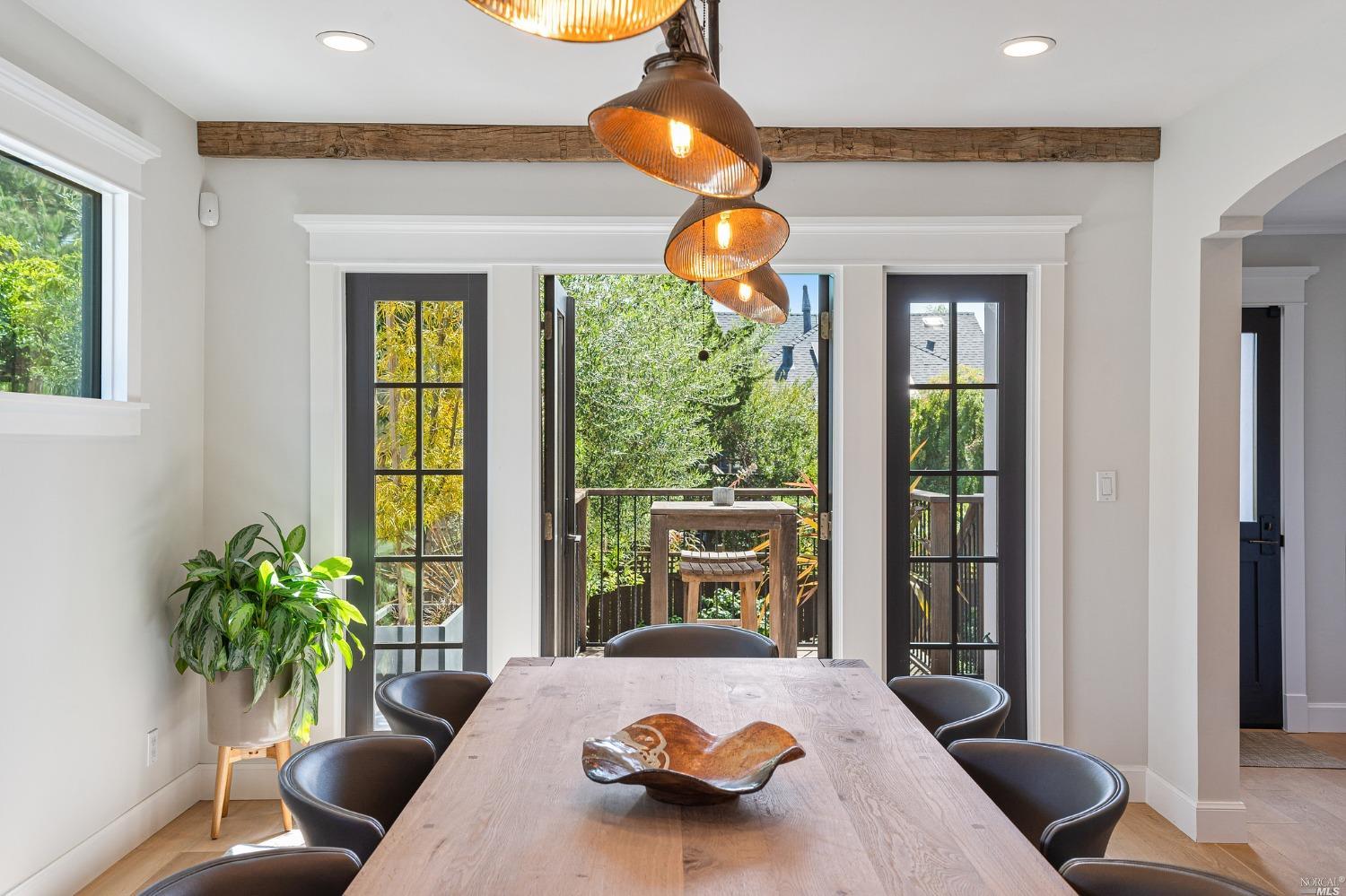 16 Hill Street Mill Valley, CA 94941 - Photo 11 of 55 a bedroom with furniture and a large window