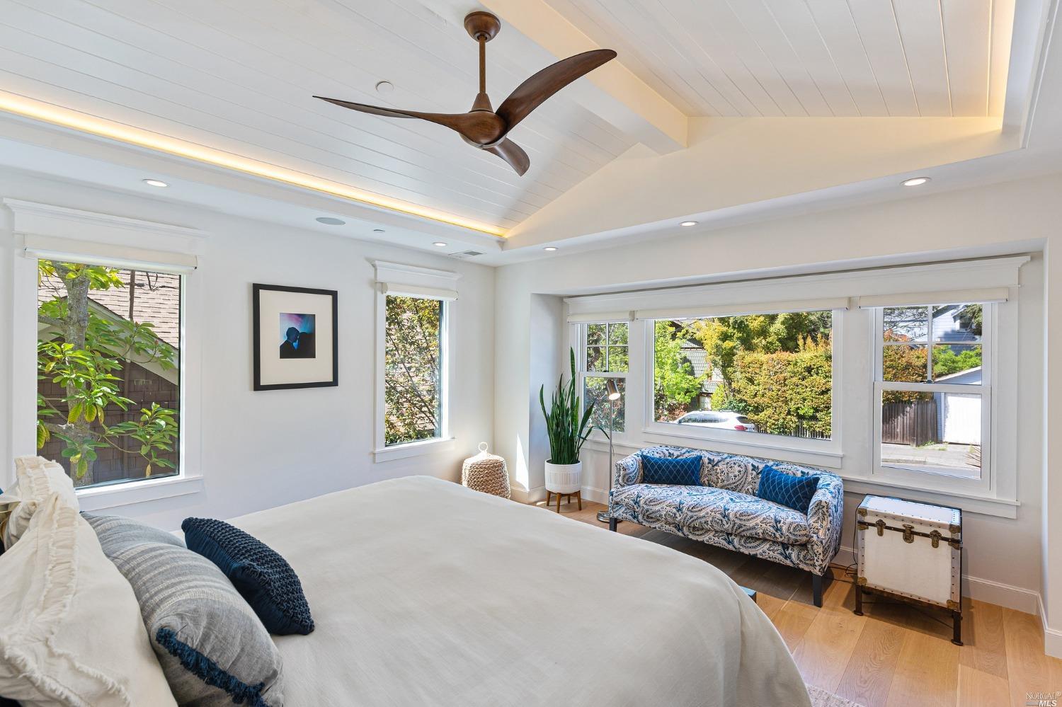 16 Hill Street Mill Valley, CA 94941 - Photo 22 of 55 a bedroom with a large bed and a large window