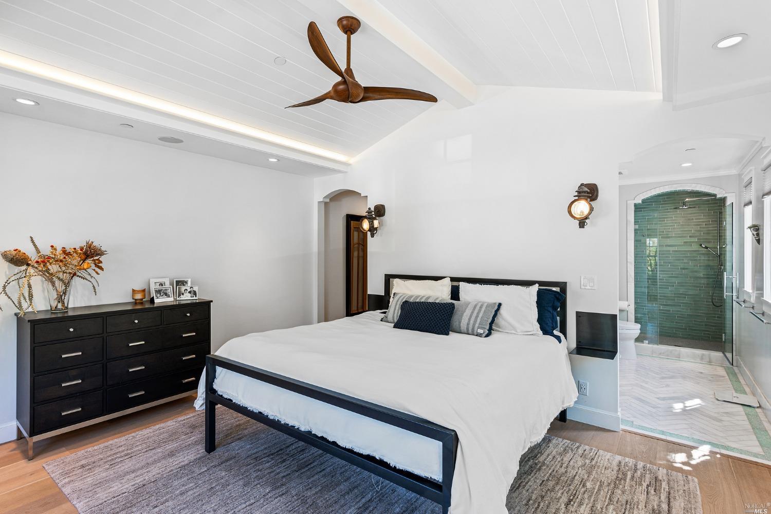 16 Hill Street Mill Valley, CA 94941 - Photo 23 of 55 a bedroom with a bed and a dresser