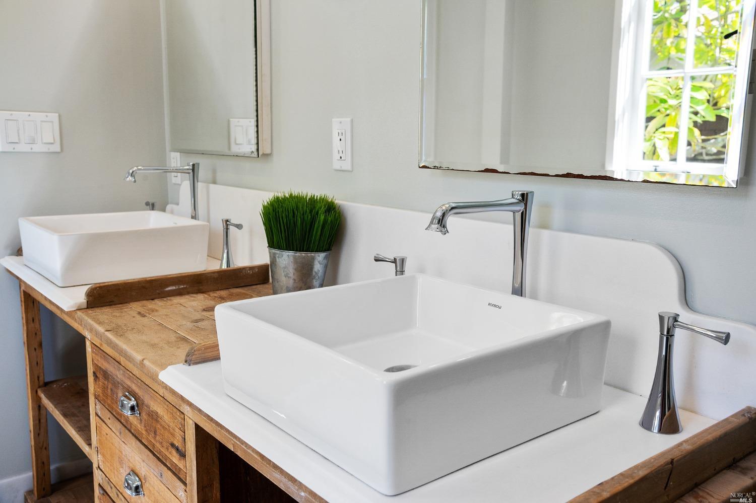 16 Hill Street Mill Valley, CA 94941 - Photo 24 of 55 a kitchen with a sink a stove and a microwave