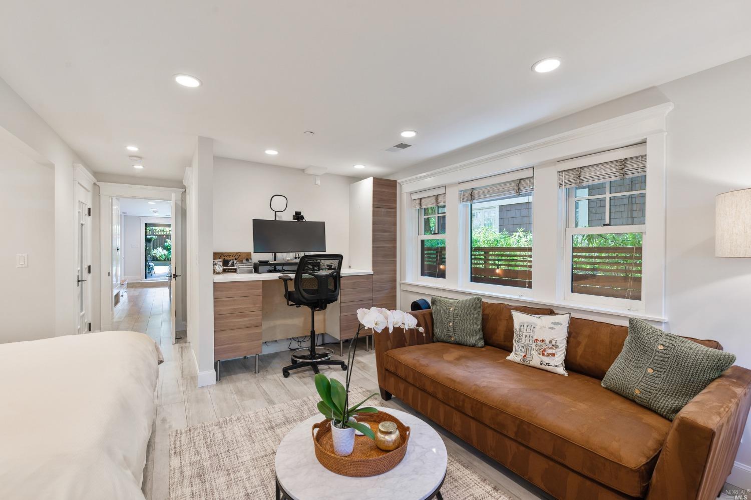 16 Hill Street Mill Valley, CA 94941 - Photo 33 of 55 a living room with furniture and a wooden floor