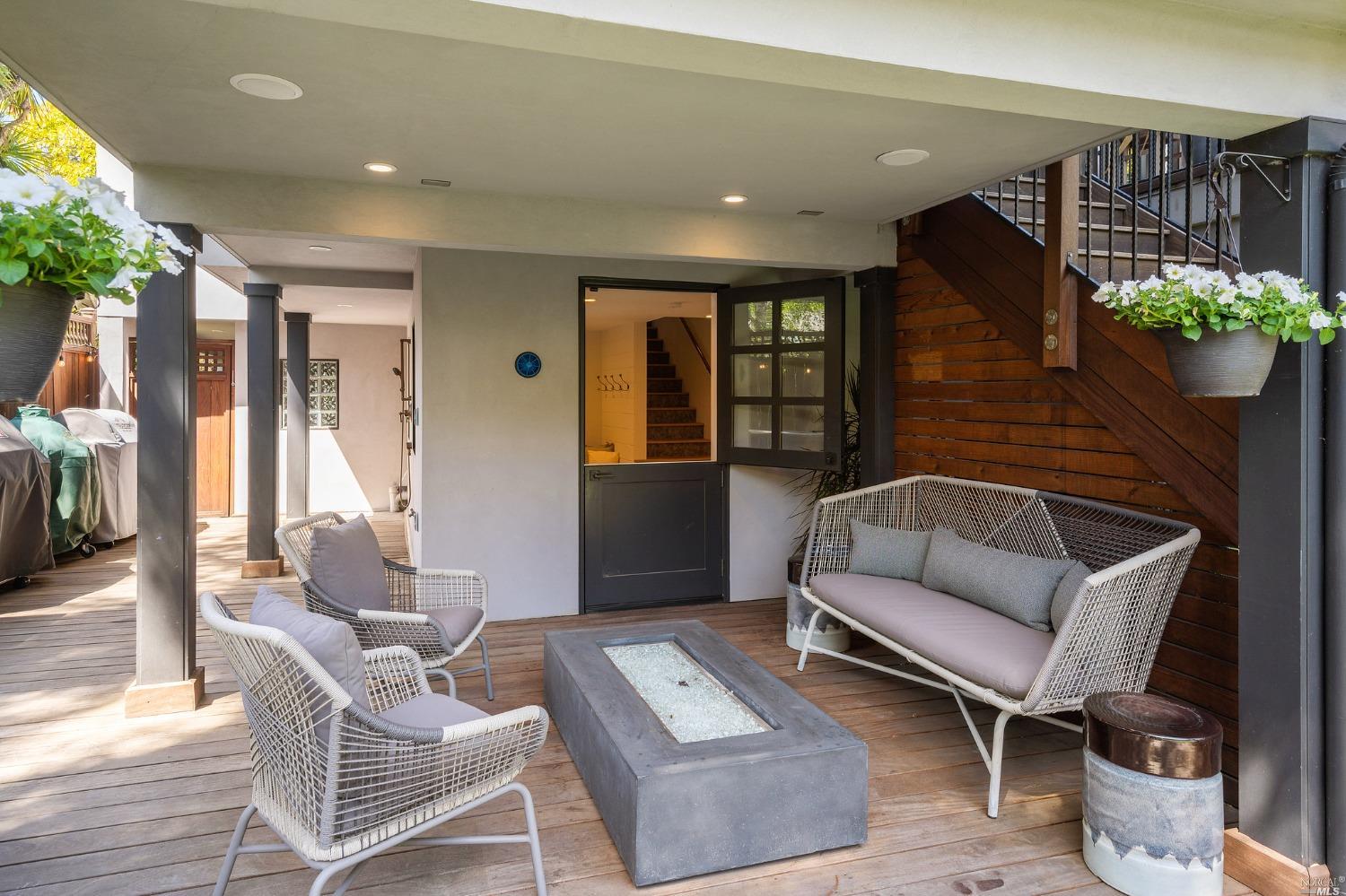 16 Hill Street Mill Valley, CA 94941 - Photo 38 of 55 a living room with furniture and a potted plant
