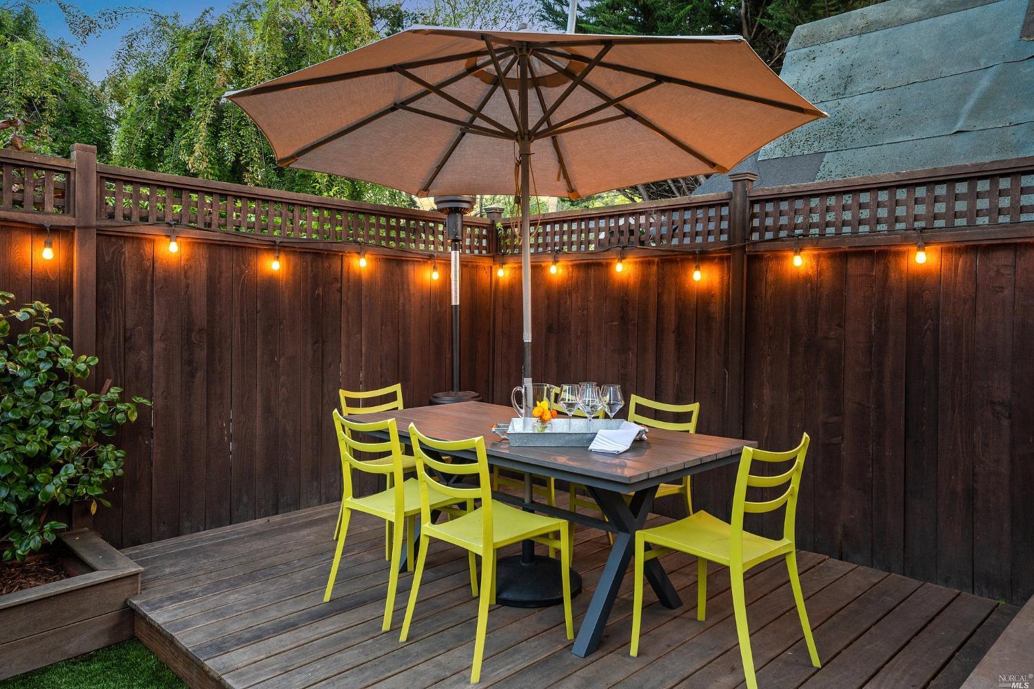 16 Hill Street Mill Valley, CA 94941 - Photo 50 of 55 a table and chairs in patio with umbrella