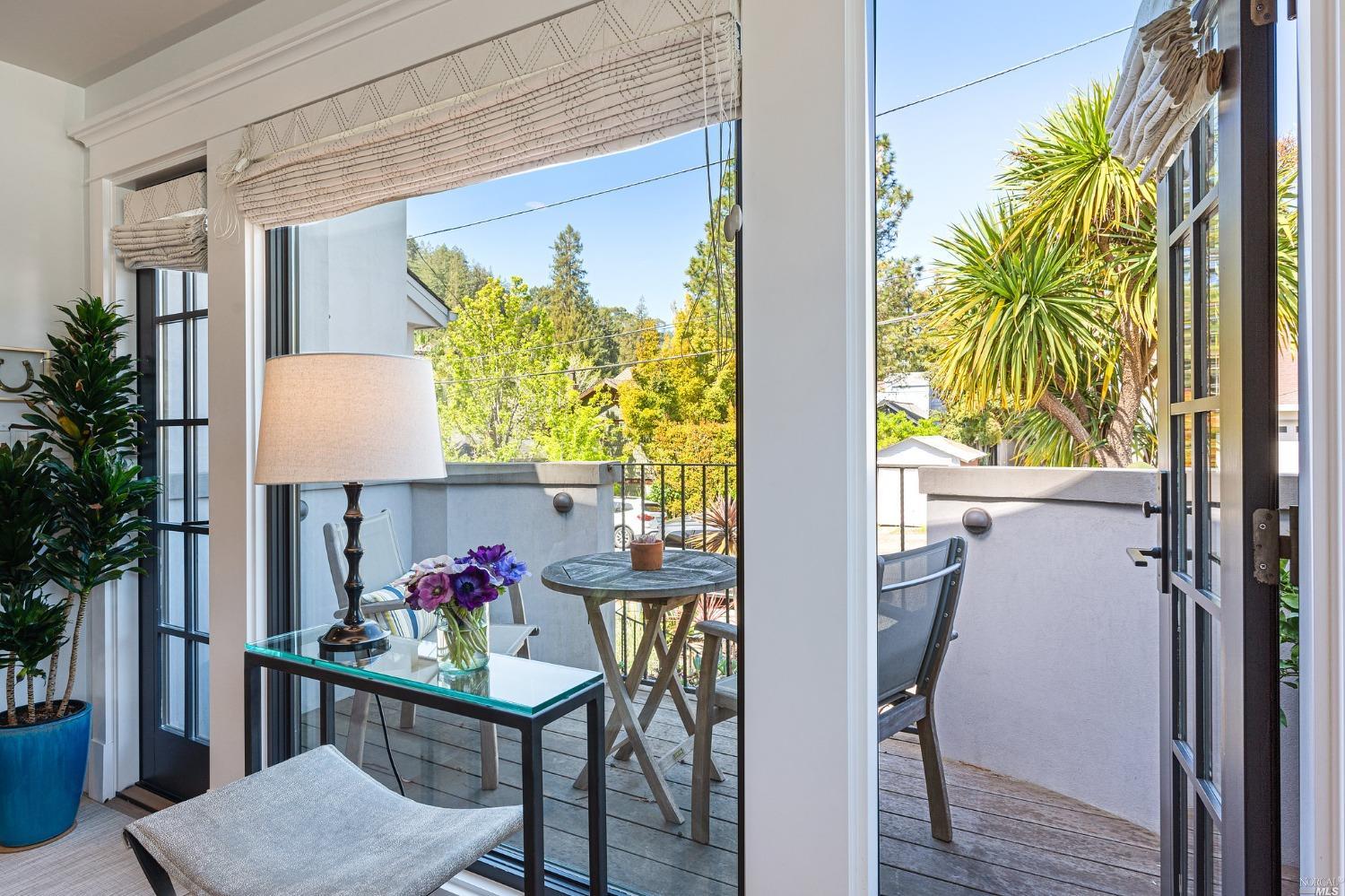 16 Hill Street Mill Valley, CA 94941 - Photo 7 of 55 a view of a dining room with furniture and a potted plant