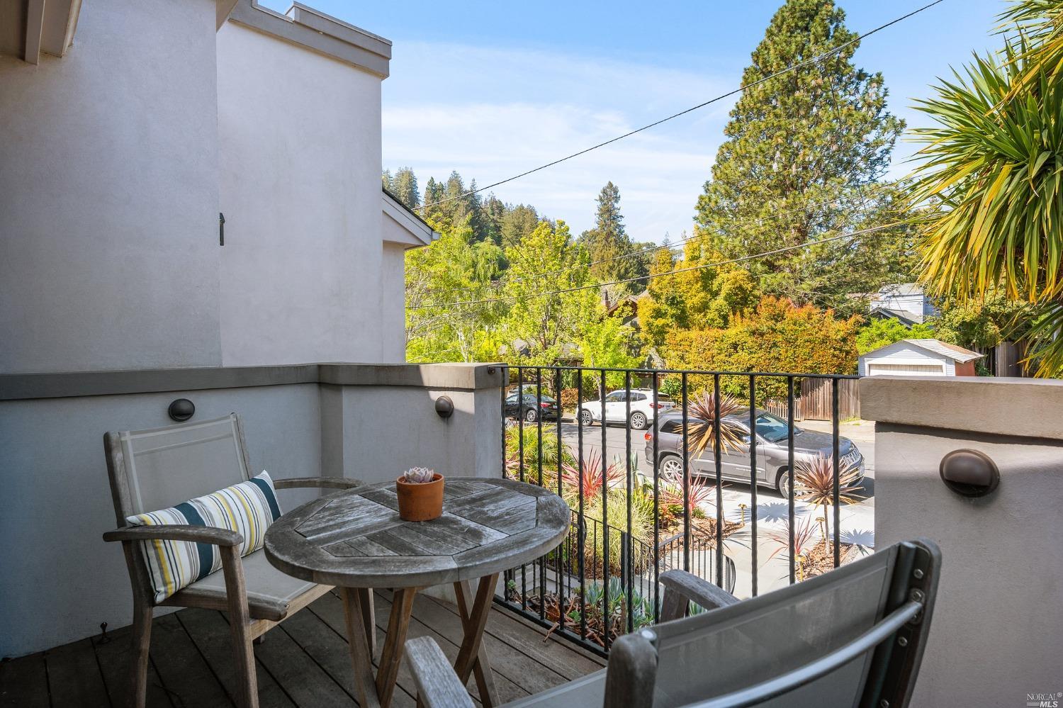 16 Hill Street Mill Valley, CA 94941 - Photo 8 of 55 a backyard of a house with table and chairs