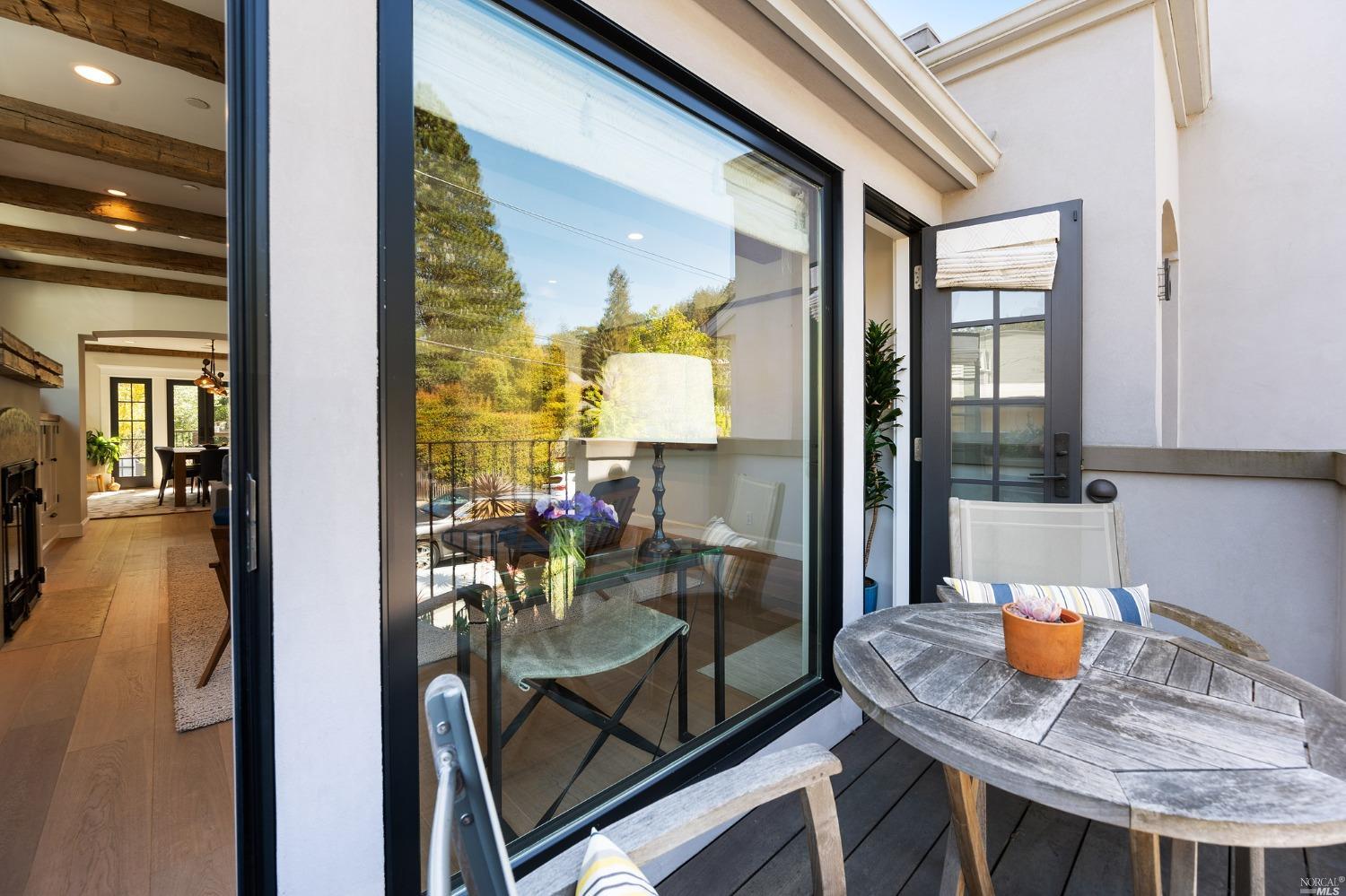 16 Hill Street Mill Valley, CA 94941 - Photo 9 of 55 a view of a dining room with furniture and wooden floor