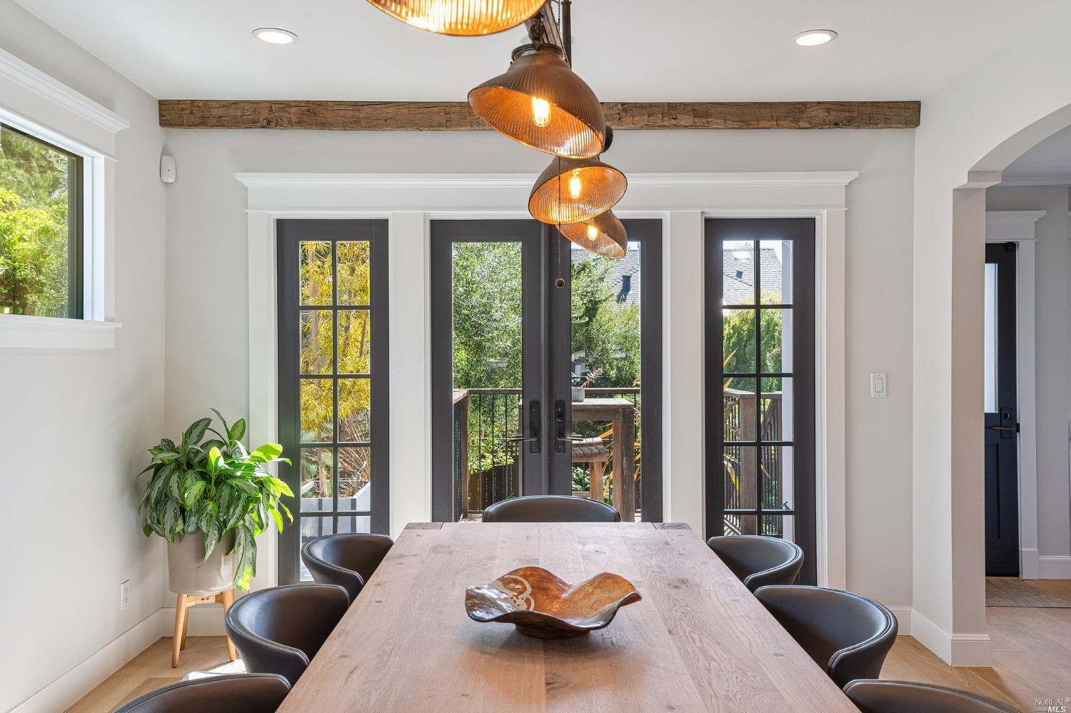 16 Hill Street Mill Valley, CA 94941 - Photo 10 of 55 a bedroom with furniture and a large window