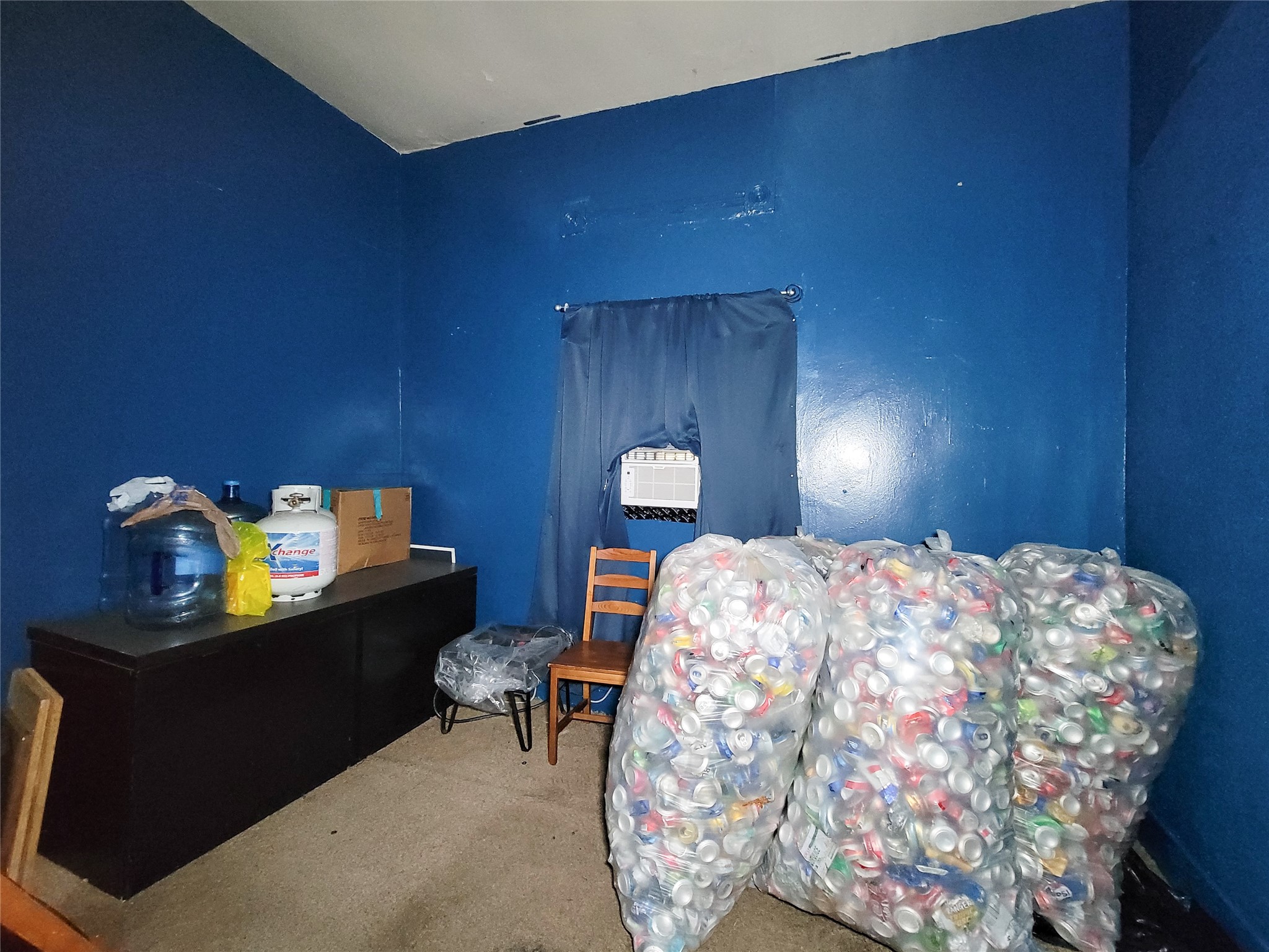 418 Bishop Street Houston, TX 77009 - Photo 12 of 32 a bedroom with a bed and a lamp on dresser