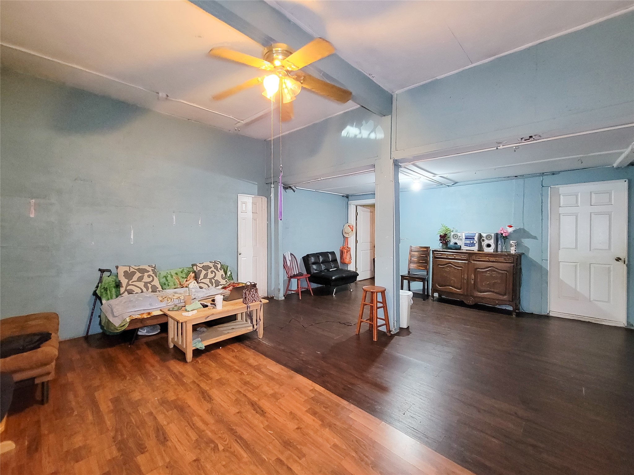 418 Bishop Street Houston, TX 77009 - Photo 4 of 32 a living room with furniture and a wooden floor