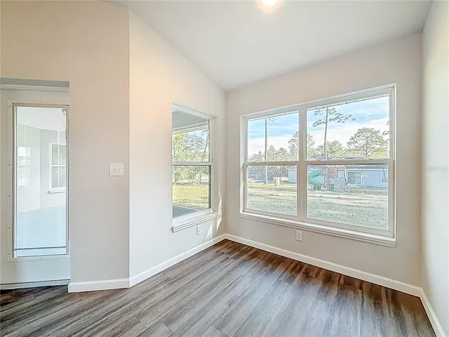 a view of a window in an empty room