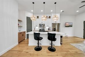 4010 Dreyfus Street Houston, TX 77021 - Photo 7 of 41 Pendant lights illuminate quartz countertops