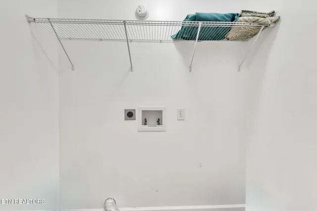 a view of small space with racks on the wall