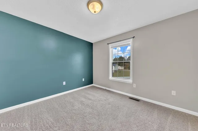 an empty room with a window