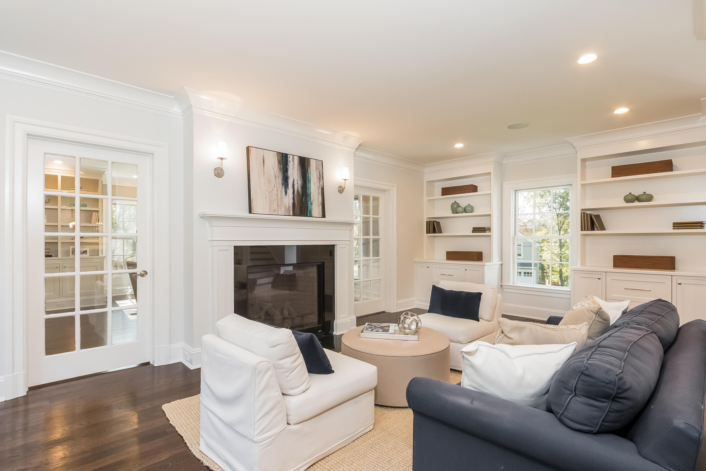36 Briar Brae Road Darien, CT 06820 - Photo 2 of 37 a living room with furniture window and a fireplace