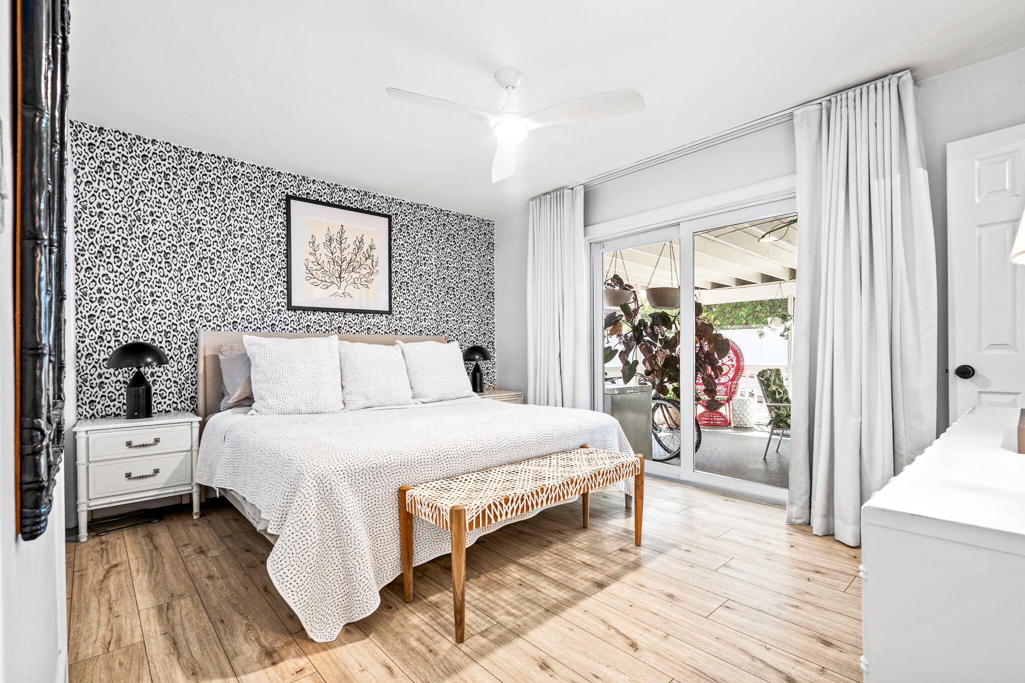 520 Flotilla Road North Palm Beach, FL 33408 - Photo 14 of 30 a bedroom with a bed and a large window