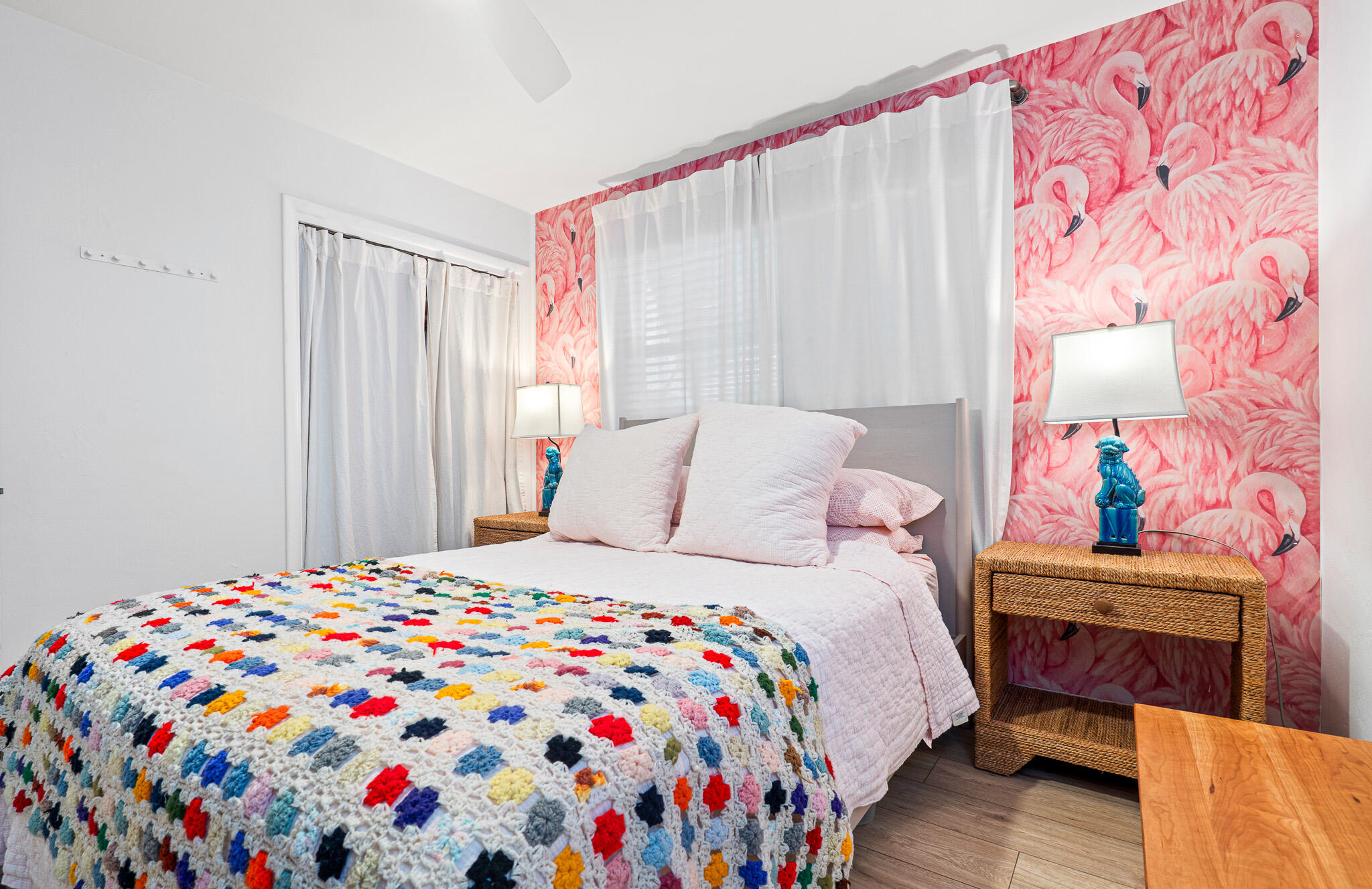 520 Flotilla Road North Palm Beach, FL 33408 - Photo 17 of 30 a bedroom with a bed and a dresser next to a window