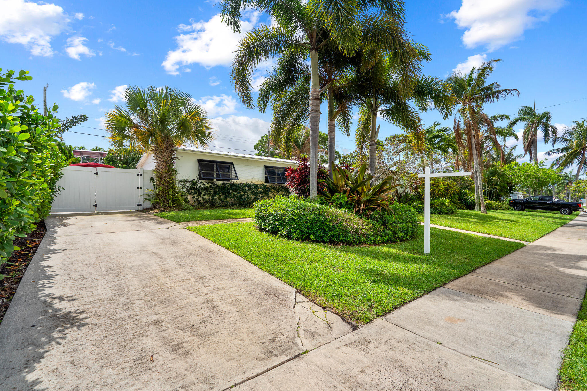 520 Flotilla Road North Palm Beach, FL 33408 - Photo 2 of 30 a view of a house with a yard