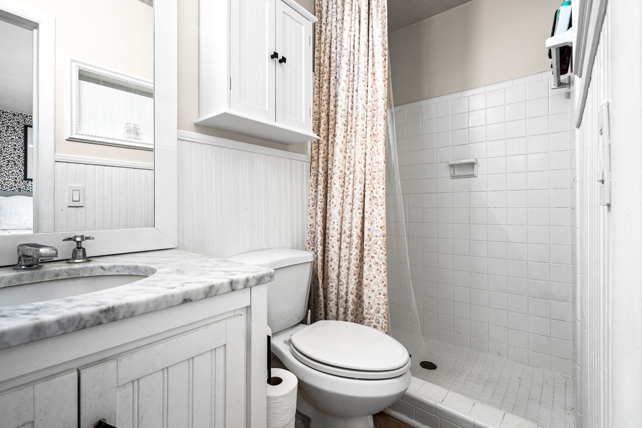 520 Flotilla Road North Palm Beach, FL 33408 - Photo 22 of 30 a bathroom with a granite countertop sink toilet and shower