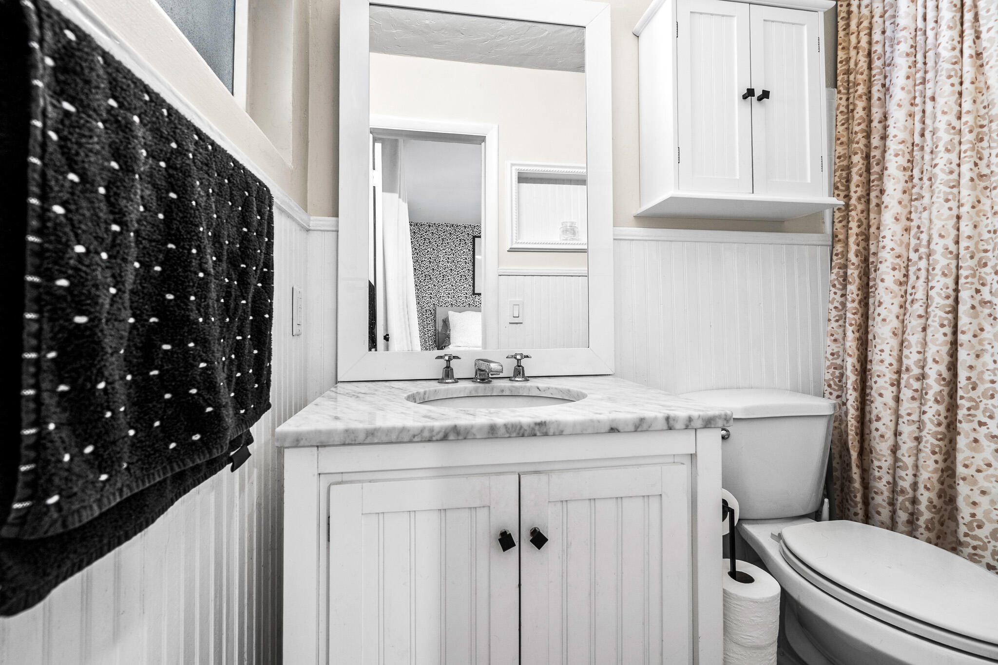 520 Flotilla Road North Palm Beach, FL 33408 - Photo 23 of 30 a bathroom with a granite countertop sink a toilet and a mirror