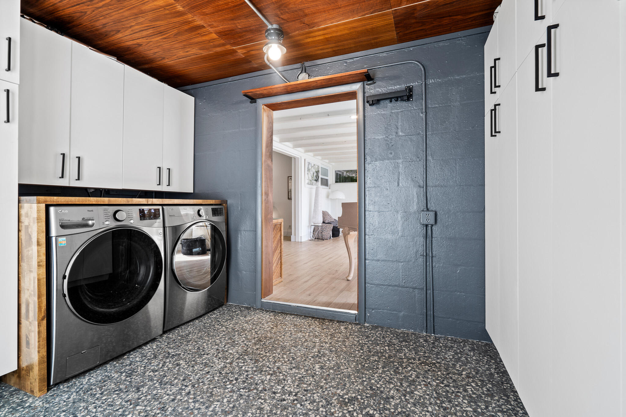 520 Flotilla Road North Palm Beach, FL 33408 - Photo 24 of 30 a view of a hallway with washer and dryer