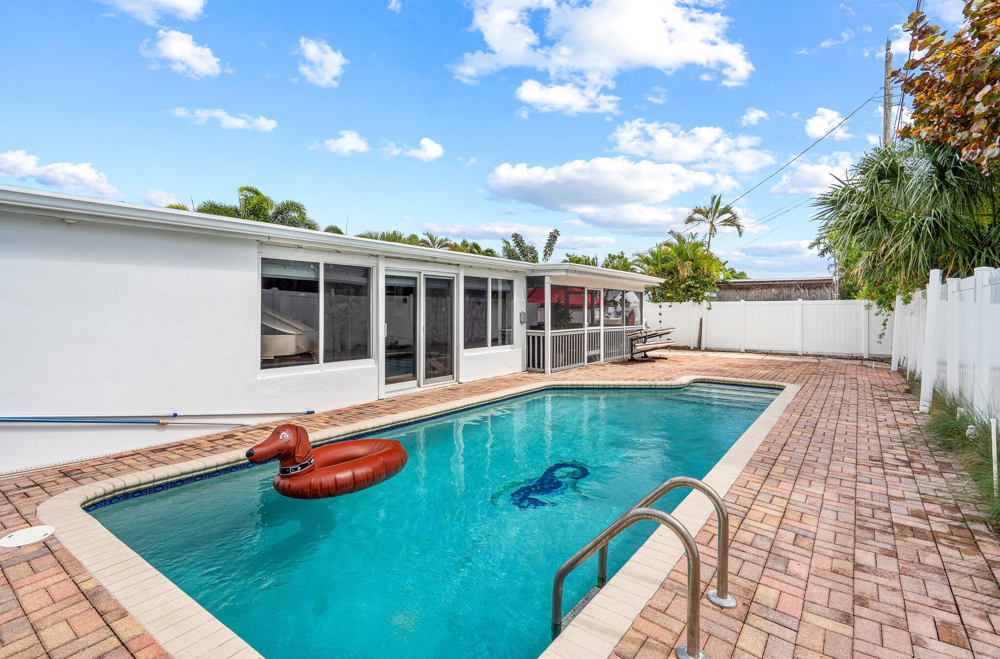 520 Flotilla Road North Palm Beach, FL 33408 - Photo 28 of 30 a view of a house with pool and sitting area