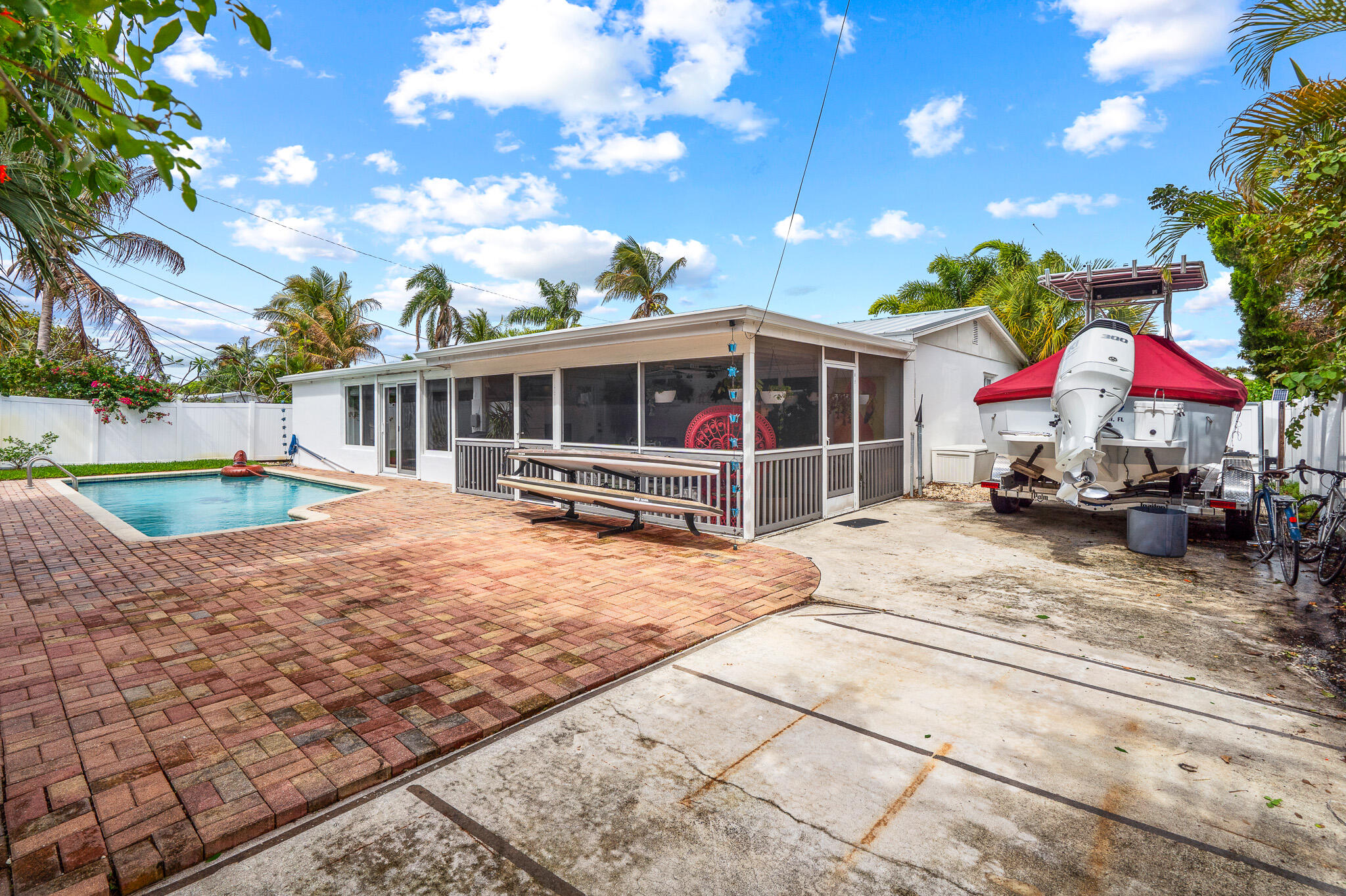 520 Flotilla Road North Palm Beach, FL 33408 - Photo 29 of 30 a view of a house with a yard porch and sitting area