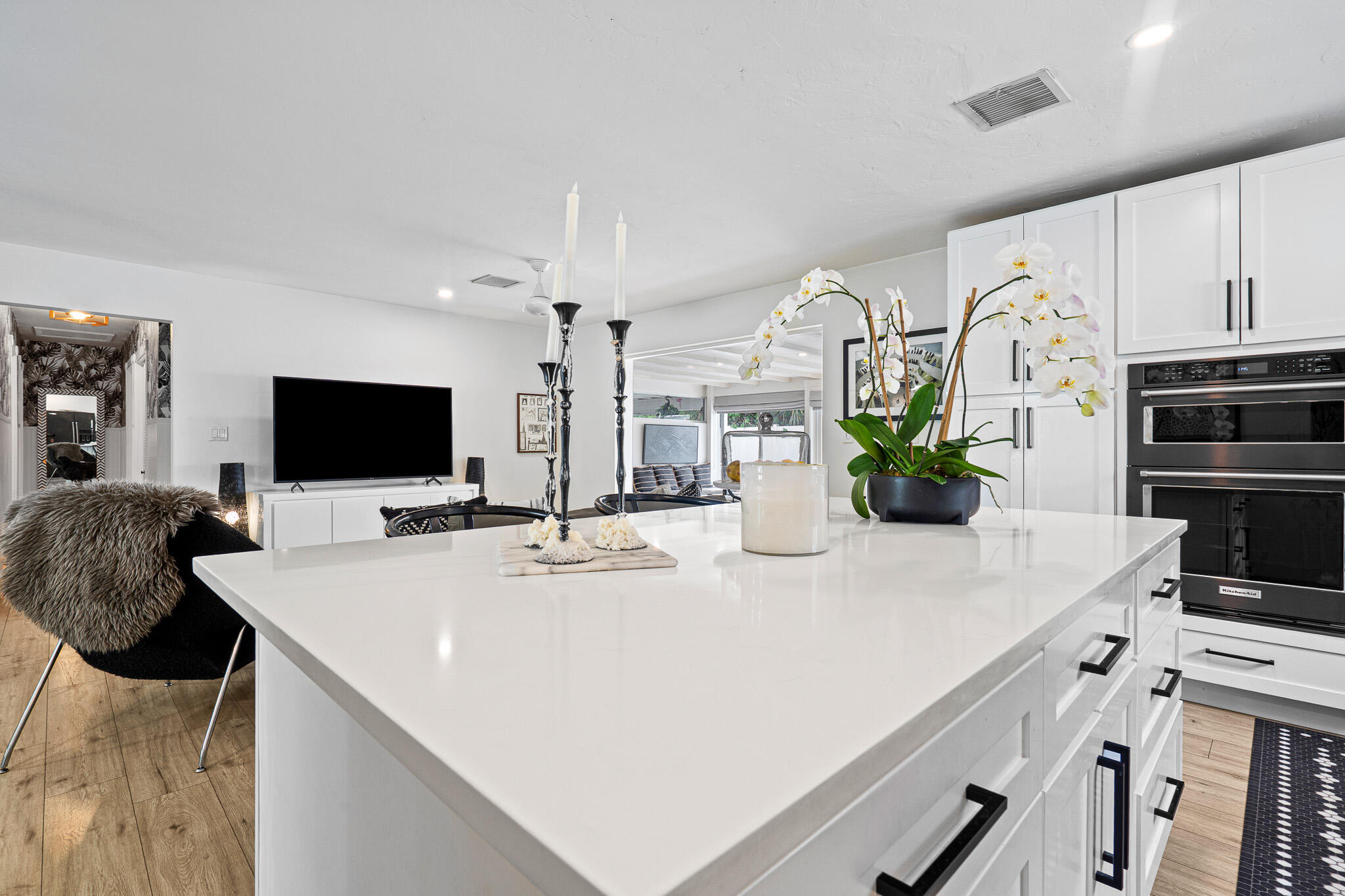 520 Flotilla Road North Palm Beach, FL 33408 - Photo 5 of 30 a kitchen with stainless steel appliances a stove refrigerator and a oven