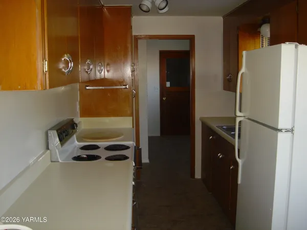 a view of a door and a window