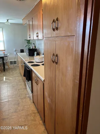 a backyard of a house with seating space