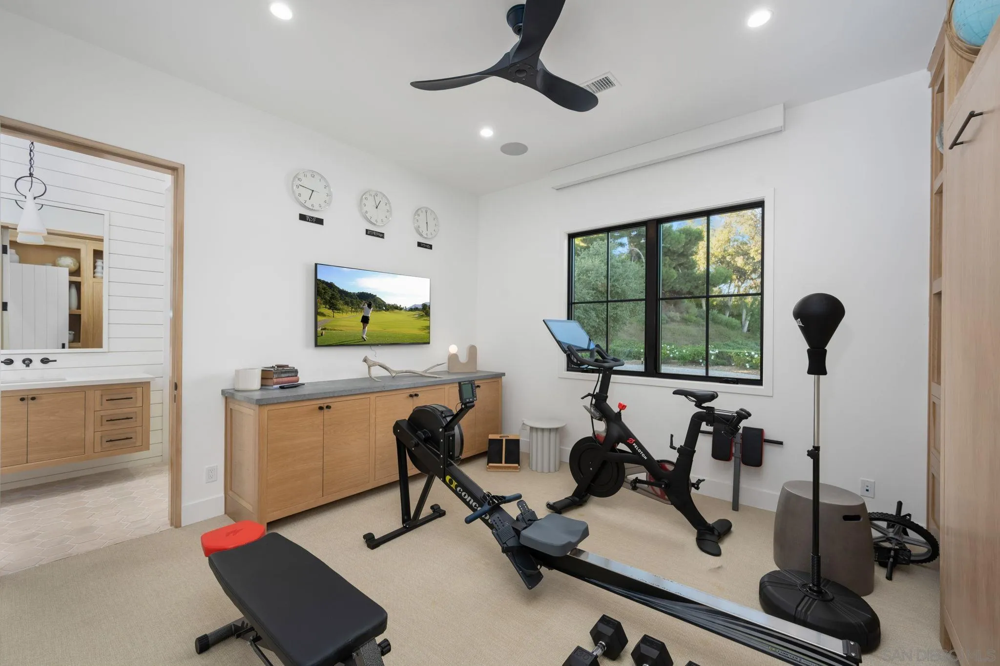 15550 El Camino Real Rancho Santa Fe, CA 92014 - Photo 17 of 35 a view of a workspace with furniture and a window