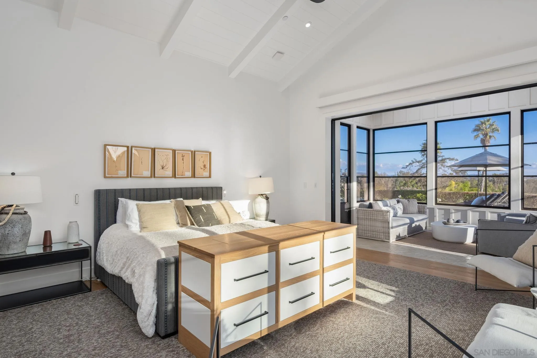 15550 El Camino Real Rancho Santa Fe, CA 92014 - Photo 21 of 35 a bed room with a bed and a couch