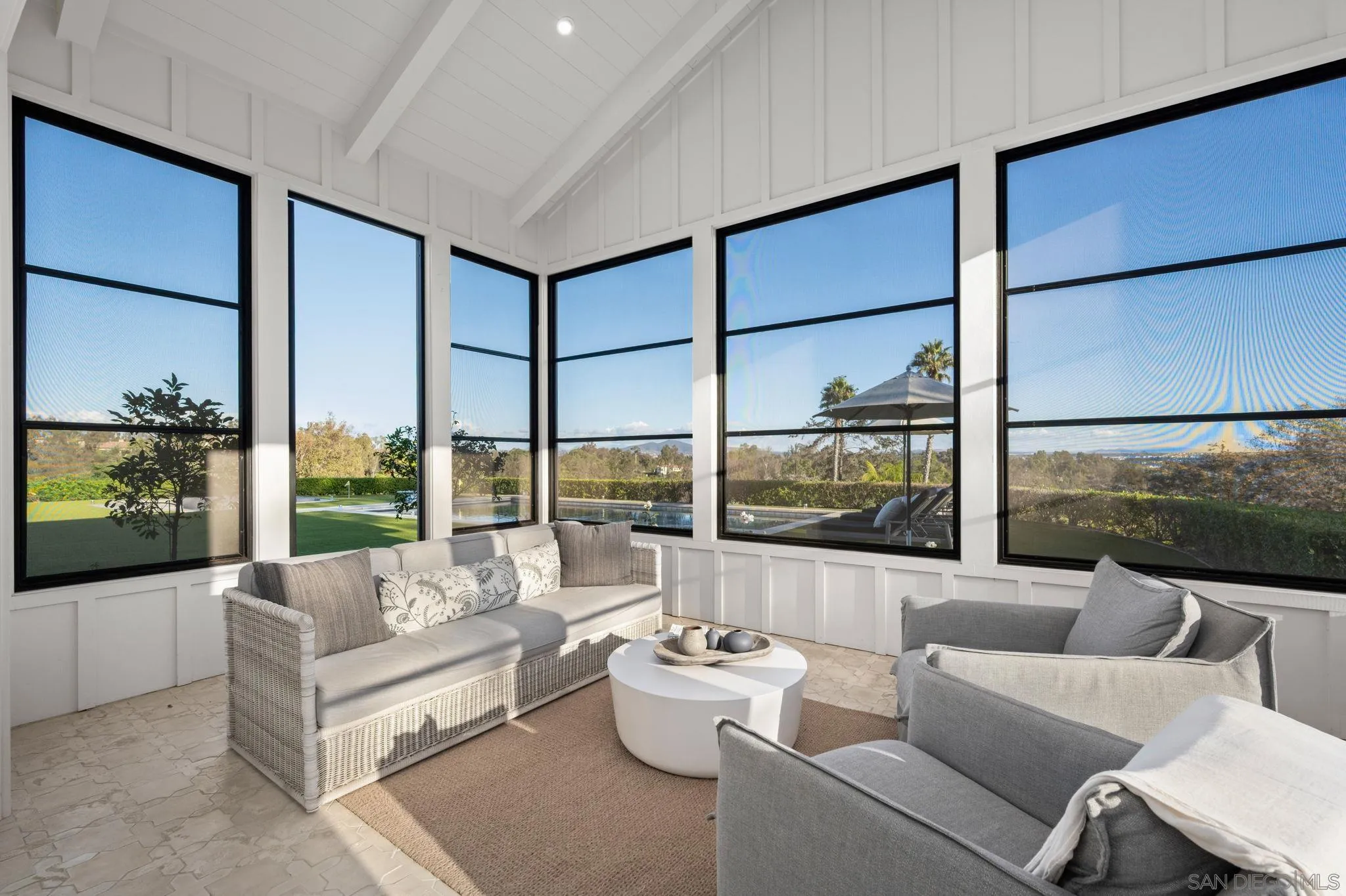 15550 El Camino Real Rancho Santa Fe, CA 92014 - Photo 22 of 35 a living room with furniture and a large window