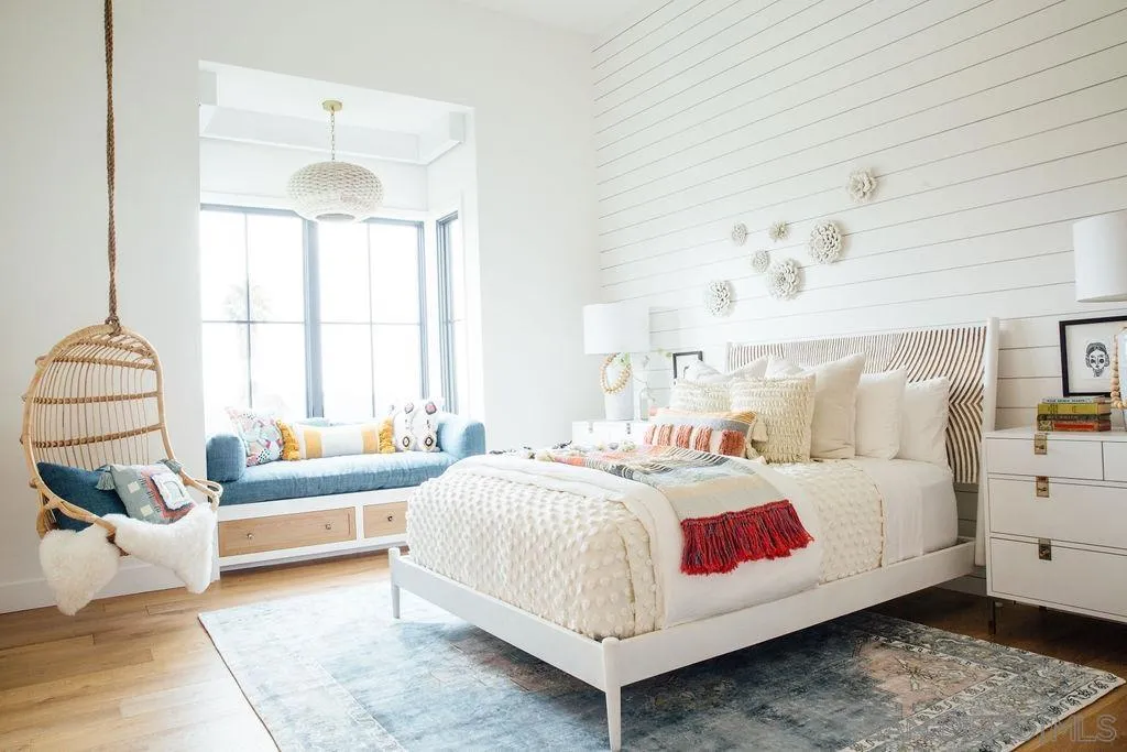 15550 El Camino Real Rancho Santa Fe, CA 92014 - Photo 26 of 35 a bedroom with a bed and a large window