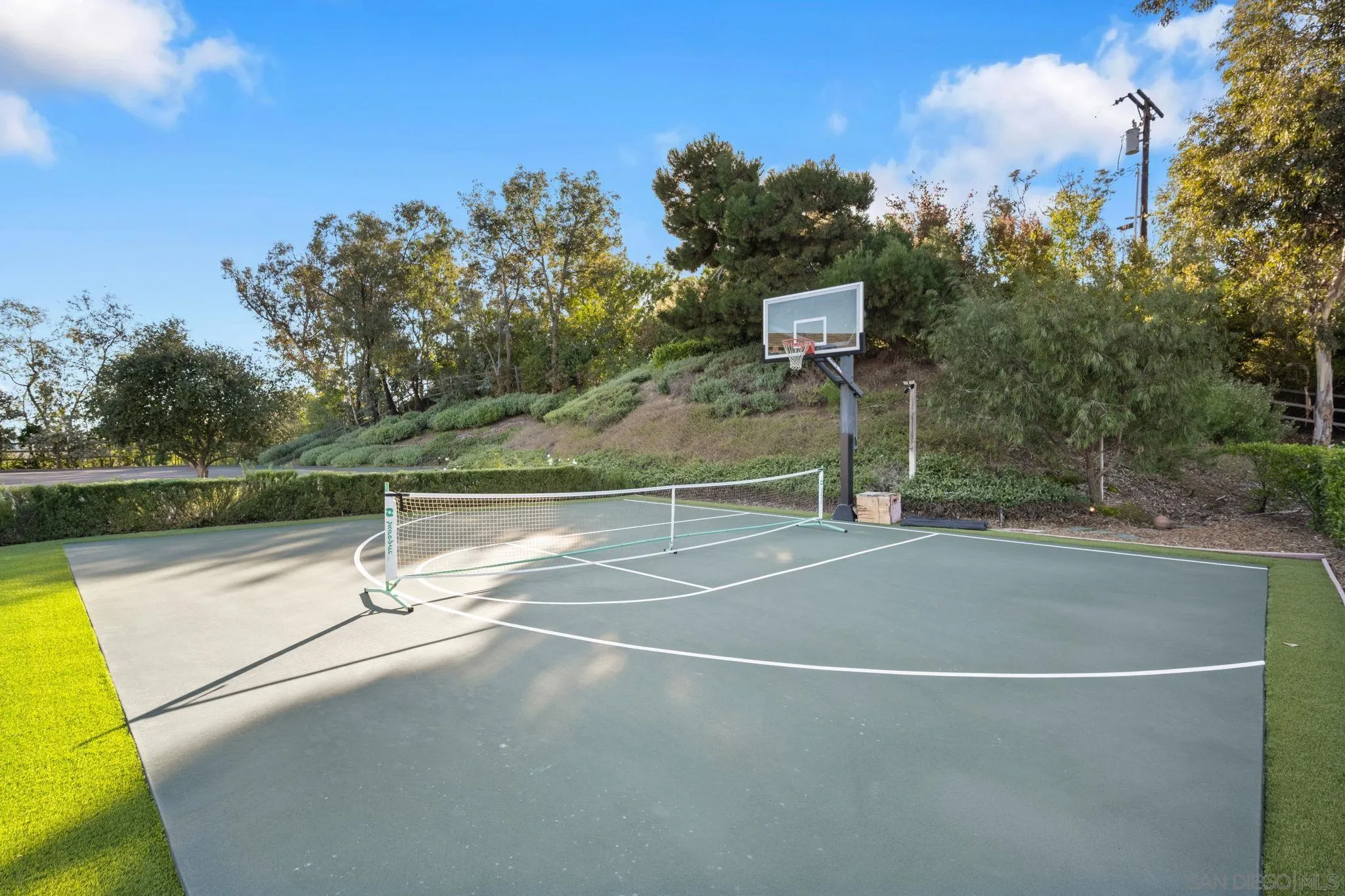 15550 El Camino Real Rancho Santa Fe, CA 92014 - Photo 31 of 35 a view of a tennis court