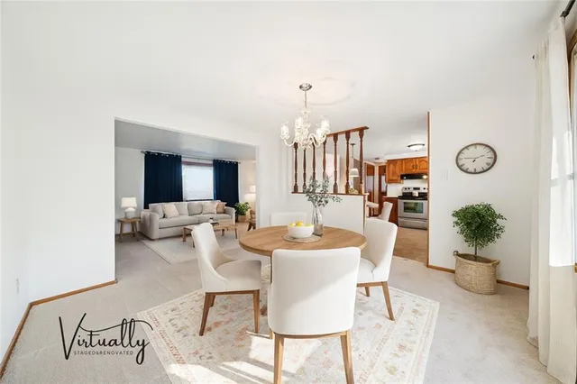 a view of a dining room with furniture