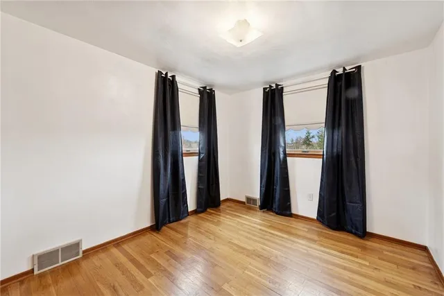 a view of a bedroom with closet area