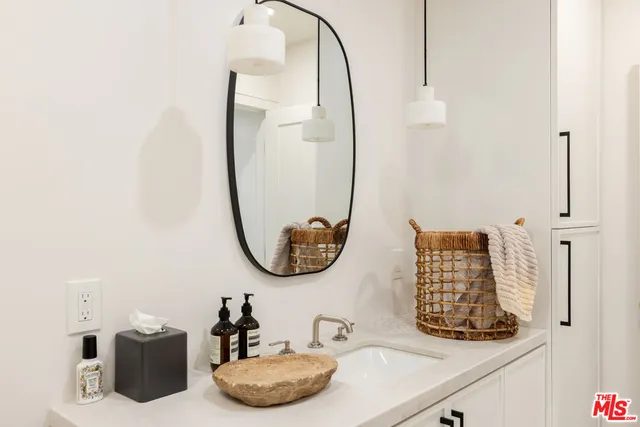 a white bath tub sitting in front of a building
