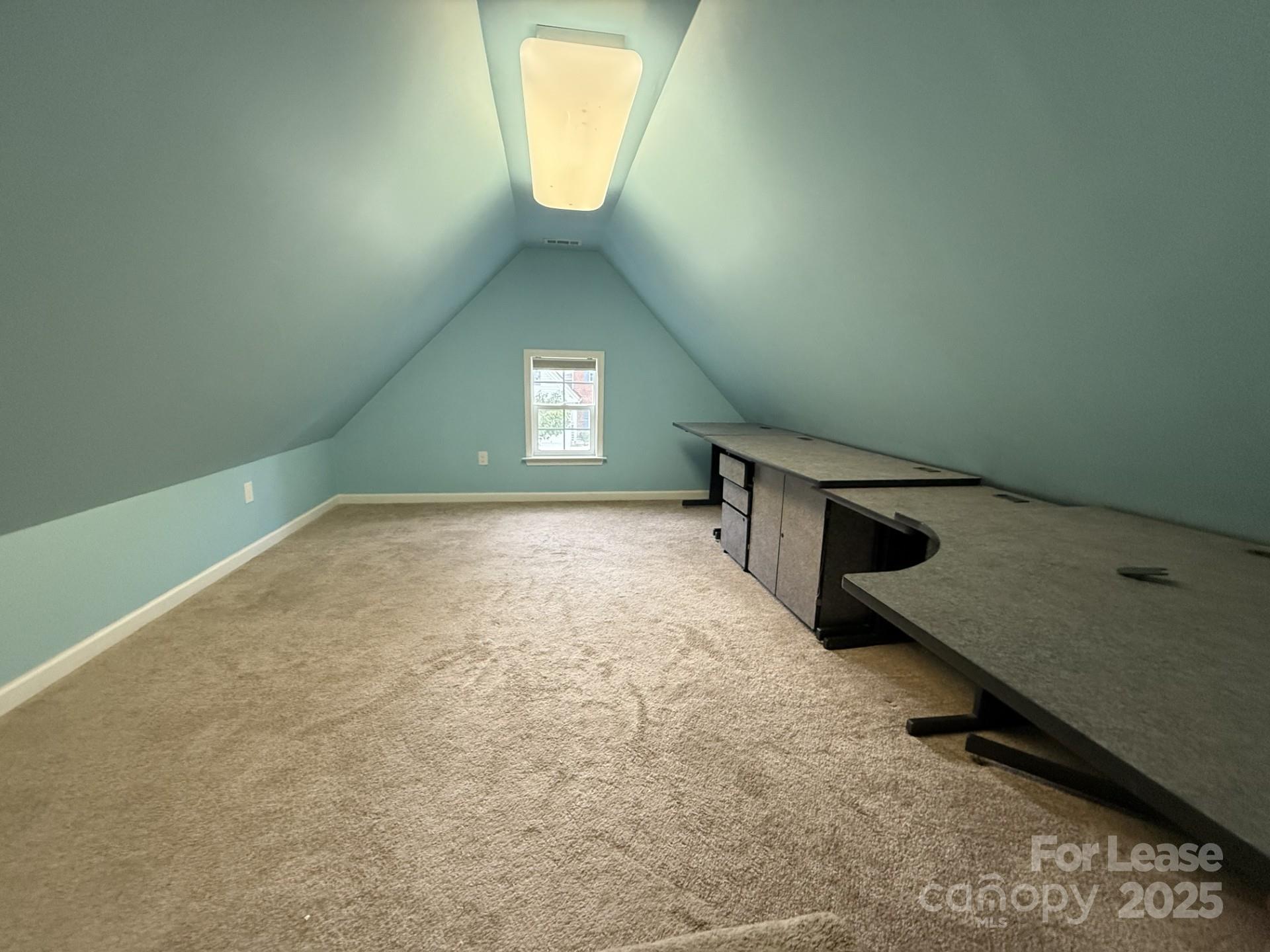 10431 Olde Ivy Way Charlotte, NC 28262 - Photo 16 of 24 an empty room with windows