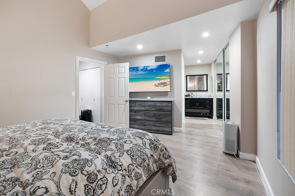 1340 Glenwood Road, Unit 8 Glendale, CA 91201 - Photo 16 of 20 a large bedroom with a bed and cabinets