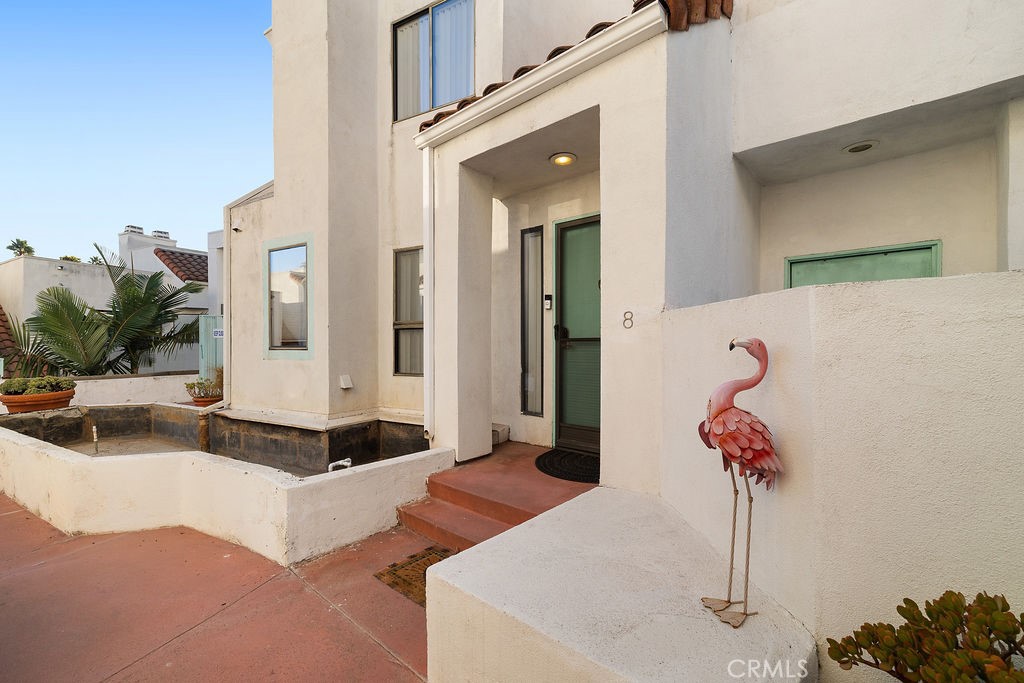 1340 Glenwood Road, Unit 8 Glendale, CA 91201 - Photo 2 of 20 a living room with furniture flowerpot and a chandelier