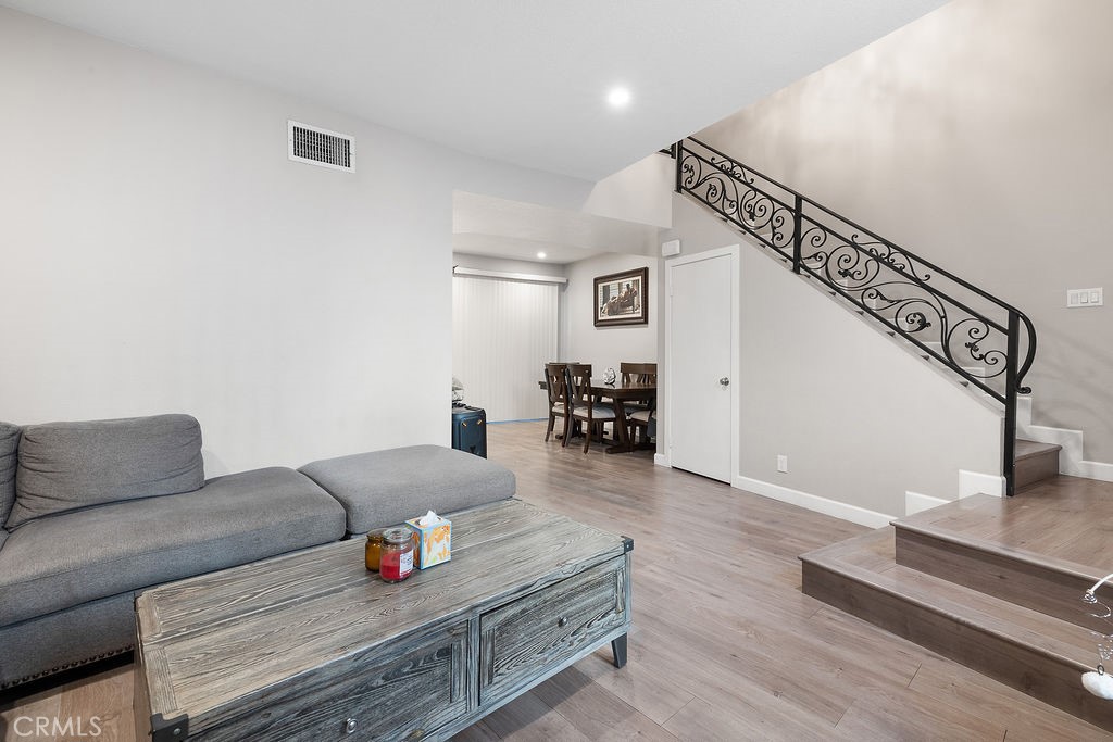 1340 Glenwood Road, Unit 8 Glendale, CA 91201 - Photo 4 of 20 a living room with furniture and stairs
