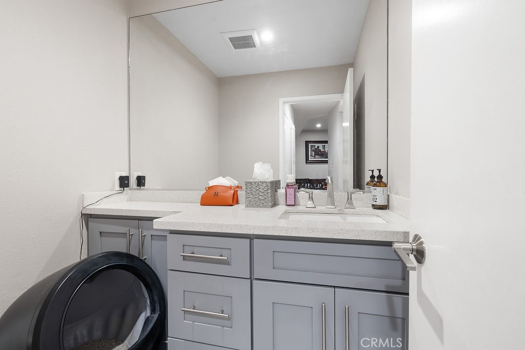 1340 Glenwood Road, Unit 8 Glendale, CA 91201 - Photo 9 of 20 a bathroom with a sink and a mirror