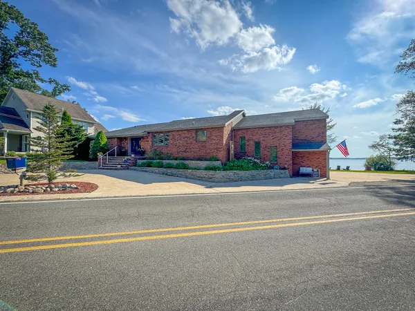 $1,200,000 | 815 East Lake Mitchell Drive, Cadillac, MI 49601