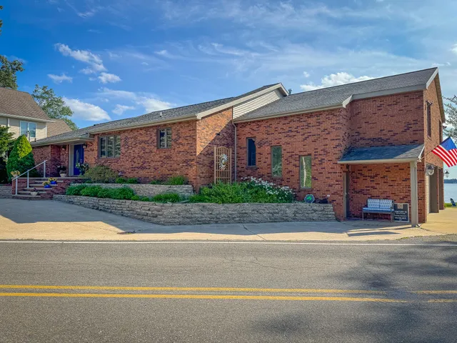 $1,200,000 | 815 East Lake Mitchell Drive, Cadillac, MI 49601