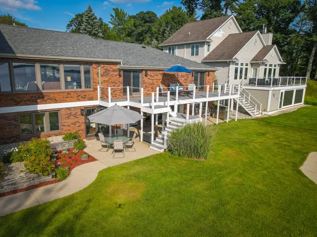 $1,200,000 | 815 East Lake Mitchell Drive, Cadillac, MI 49601