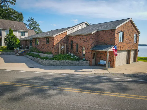 $1,200,000 | 815 East Lake Mitchell Drive, Cadillac, MI 49601