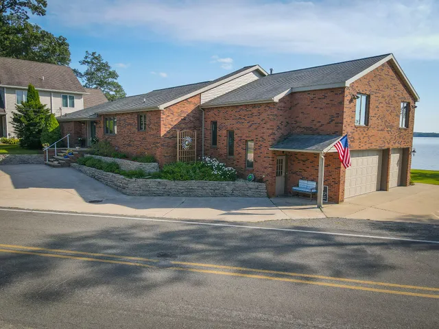 $1,200,000 | 815 East Lake Mitchell Drive, Cadillac, MI 49601