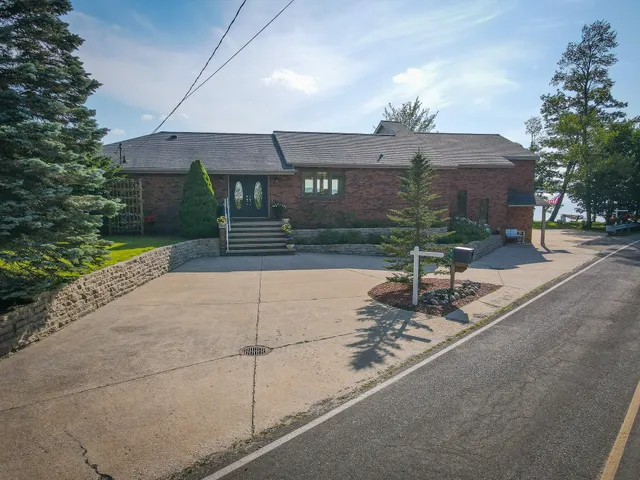 $1,200,000 | 815 East Lake Mitchell Drive, Cadillac, MI 49601