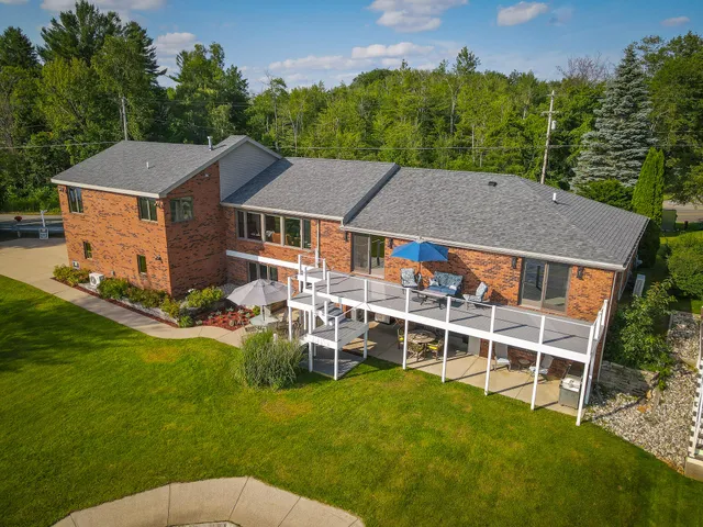 $1,200,000 | 815 East Lake Mitchell Drive, Cadillac, MI 49601