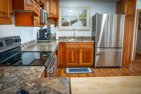 $1,200,000 | 815 East Lake Mitchell Drive, Cadillac, MI 49601